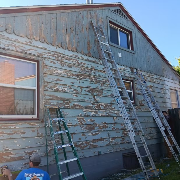 Siding preparation on a house gable