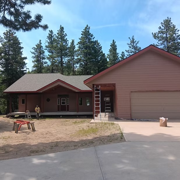 Brown home and attached garage